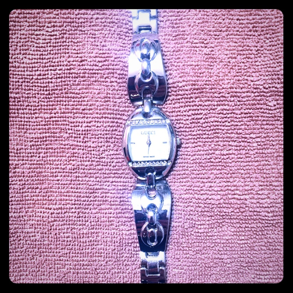 Gucci women's watch mother of Pearl and diamonds